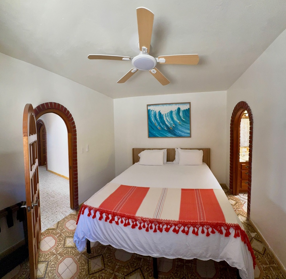 Another bedroom with a California King bed