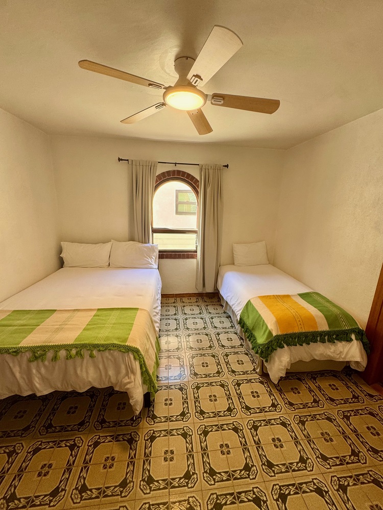 This room has a Queen Bed and a Twin Bed